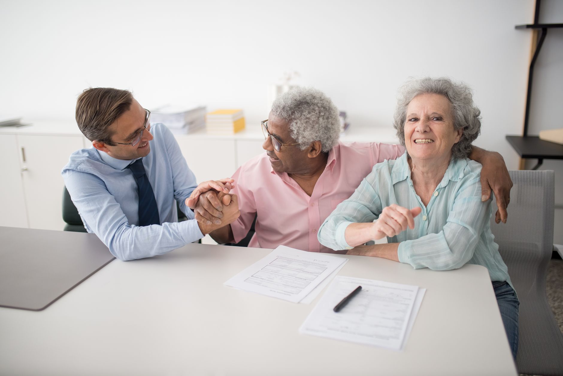 Older couple reviewing financial statements at home
