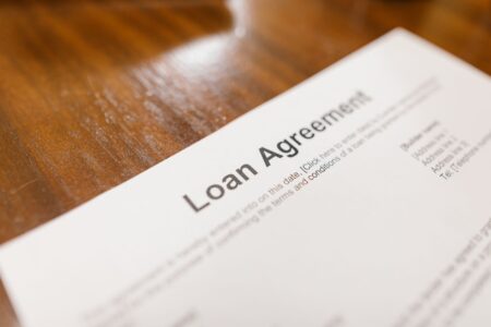 Collateralized Mortgage Obligations Quietly Regain Ground Among Spread Seekers Mortgage loan documents and financial paperwork on a desk