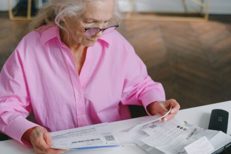 Variable Annuity Subaccounts Quietly Regain Ground Among Fee-Wary Retirees Senior couple reviewing retirement financial documents at a desk