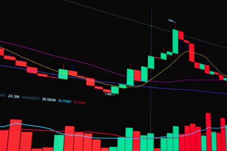Stock market trading screens showing share price movements and voting data