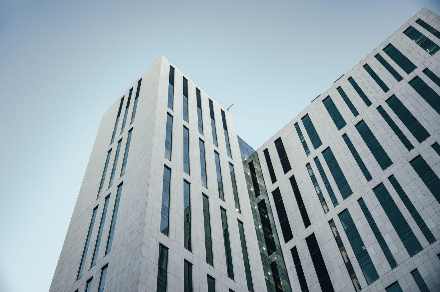 Modern commercial real estate building exterior representing closed-end fund property holdings