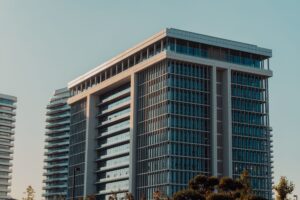 Modern commercial real estate building exterior representing REIT property assets