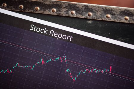 Financial charts showing stock price movements during a merger announcement period