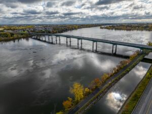 Aerial view of a large infrastructure bridge representing long-duration asset investment