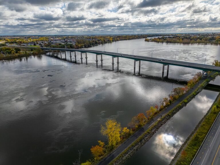 Aerial view of a large infrastructure bridge representing long-duration asset investment