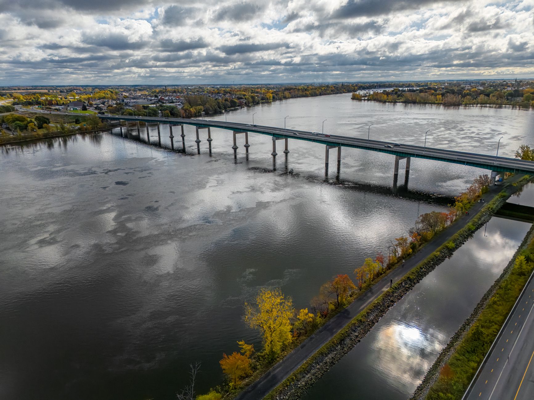 Aerial view of a large infrastructure bridge representing long-duration asset investment