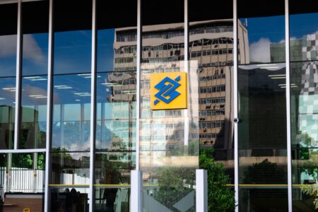 Contingent Convertible Bonds Quietly Resurface Among Bank Capital Seekers Exterior of a large commercial bank building representing institutional finance