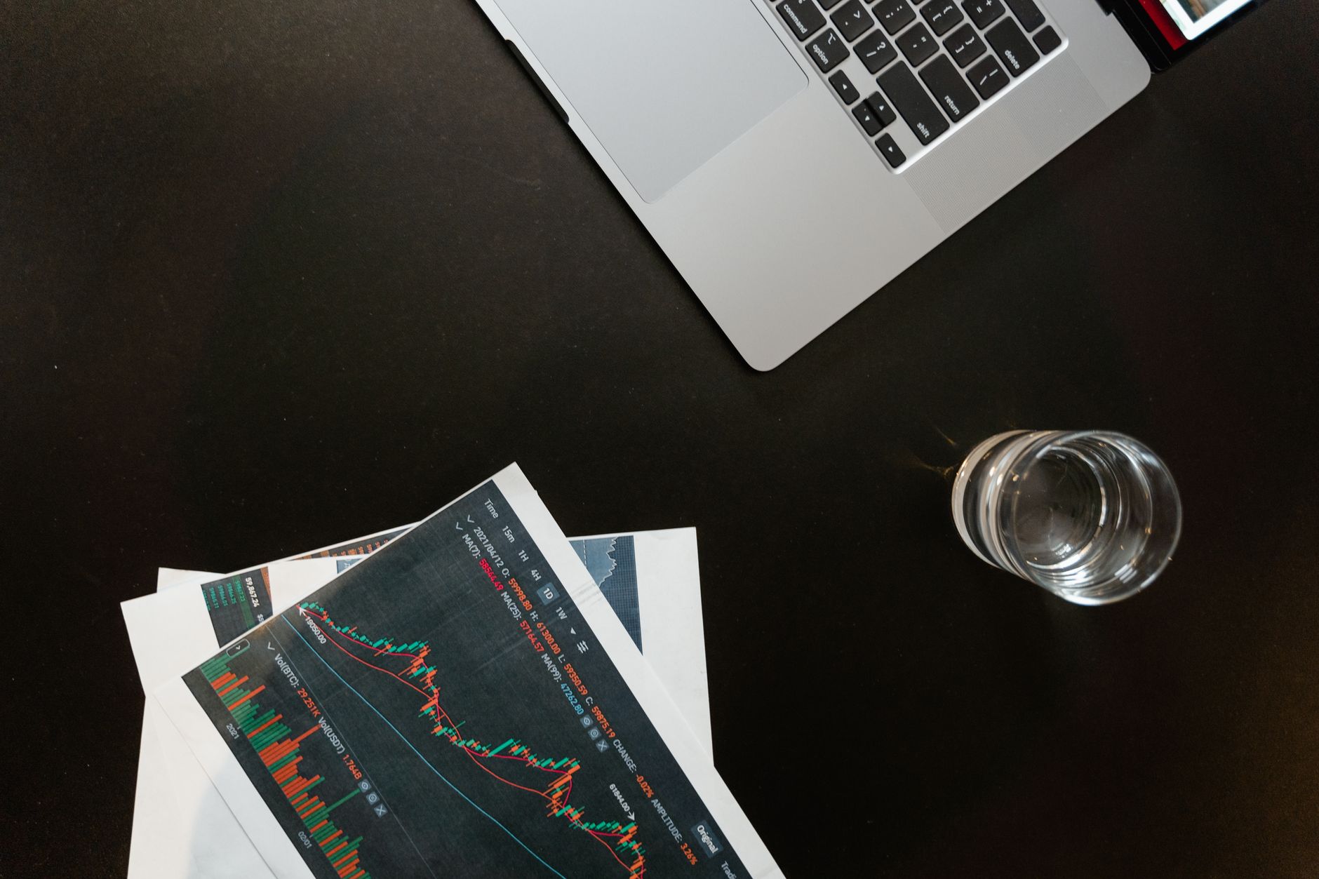 Bank treasury trading desk with multiple screens showing bond market data