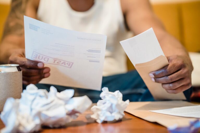 Close-up of financial documents representing corporate debt instruments and bond agreements