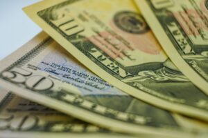 Defined Maturity Bond ETFs Quietly Absorb Ladder-Seeking Retail Demand Close-up of financial documents and bond certificates representing fixed-income investing