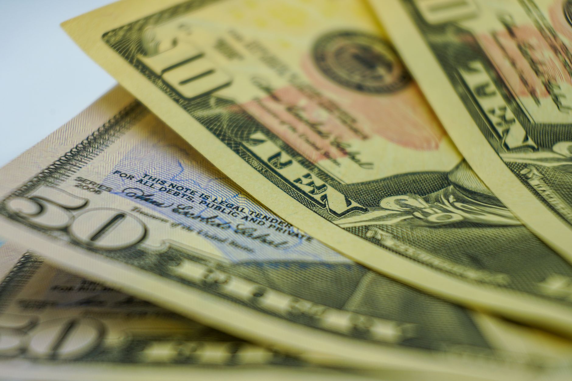 Close-up of financial documents and bond certificates representing fixed-income investing