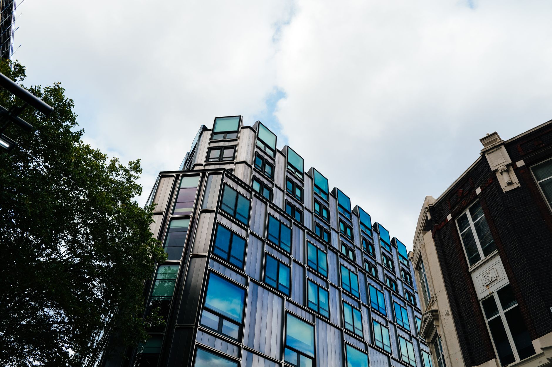Urban office and mixed-use property exterior illustrating real estate portfolio assets