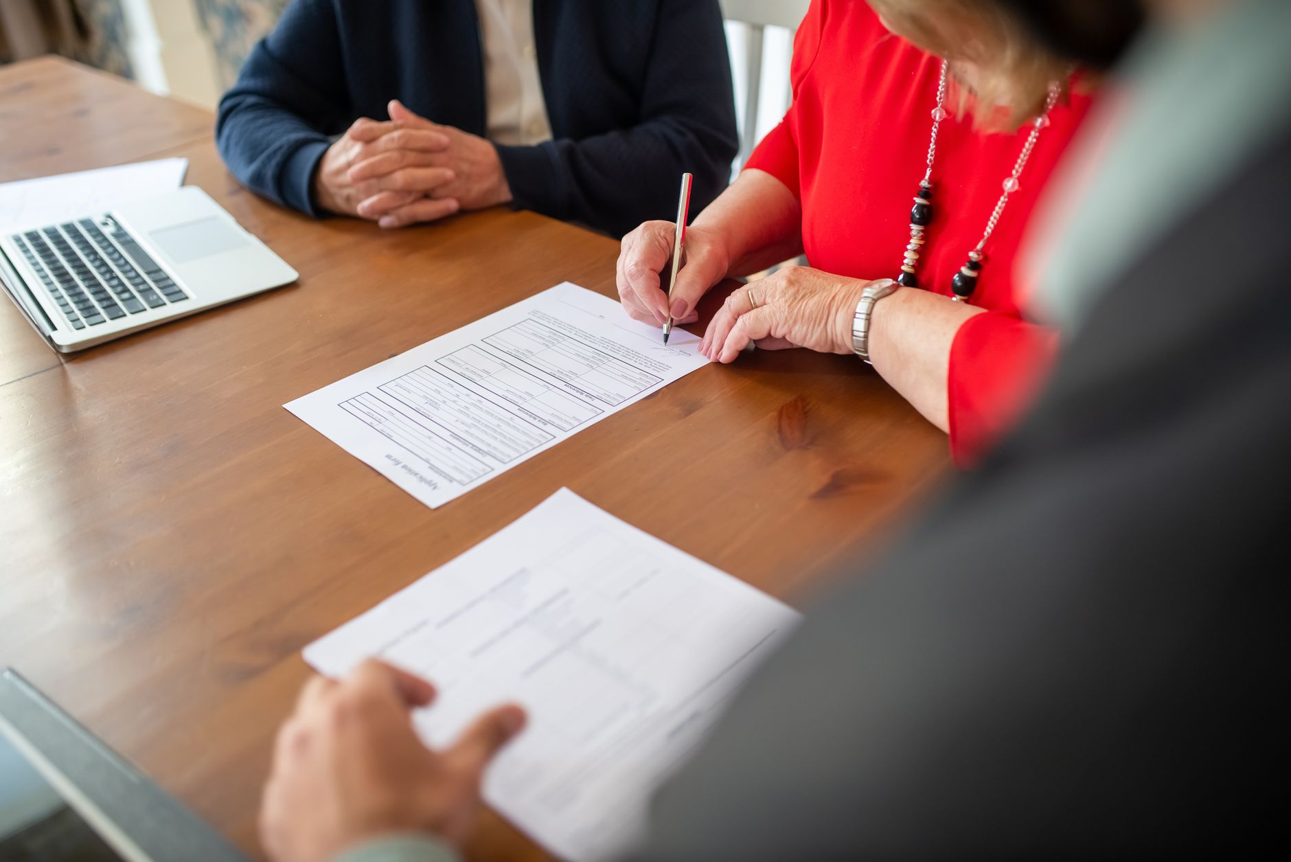 Close-up of mortgage documents being reviewed, representing mortgage-backed securities collateral