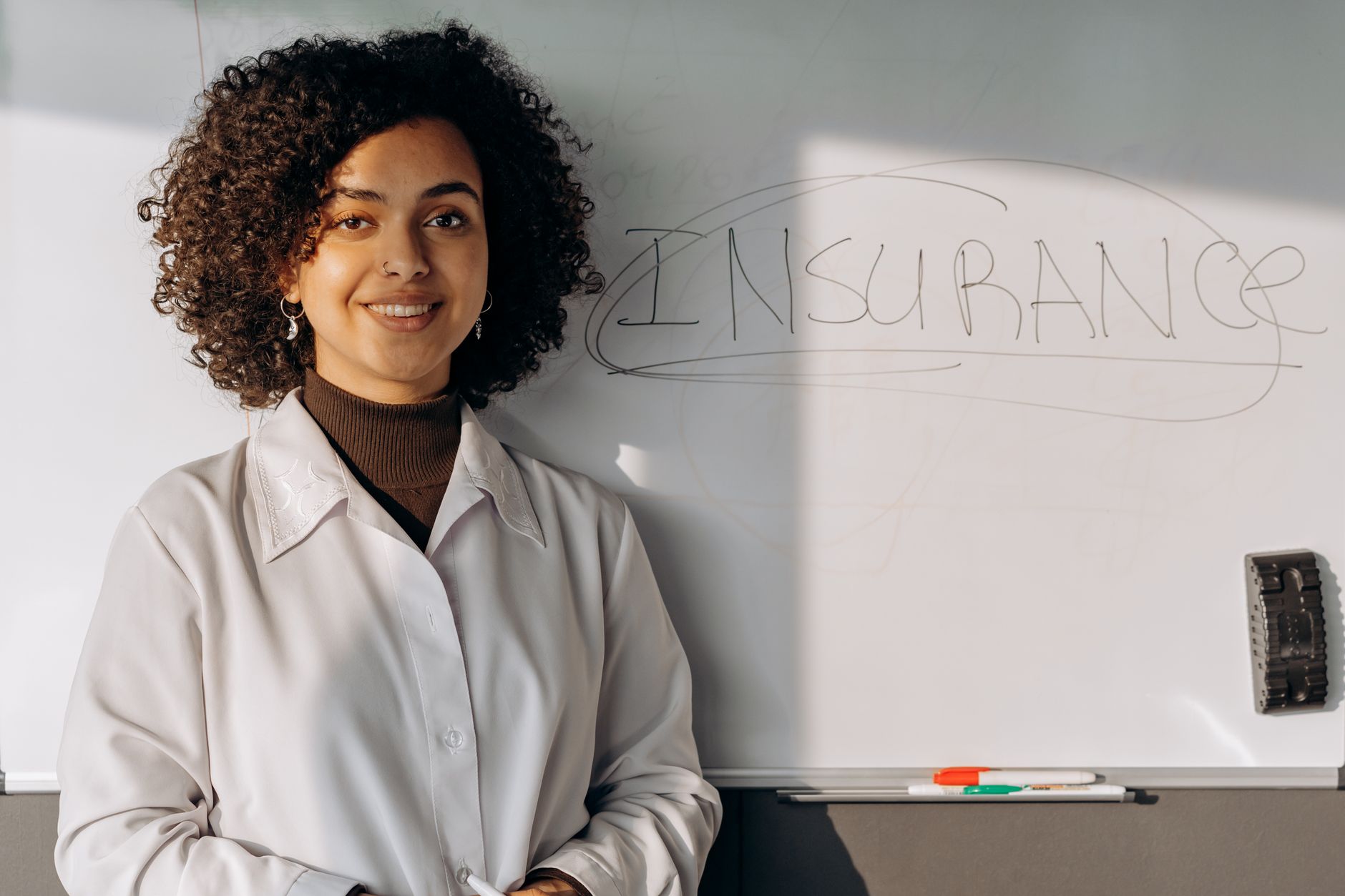 Insurance company office with professionals reviewing fixed income portfolio documents