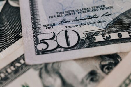 Treasury Inflation-Protected Securities Regain Favor as Deficits Widen Stack of government bond certificates representing Treasury Inflation-Protected Securities