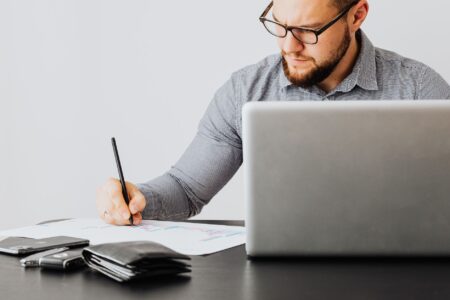 High-Yield Municipal Money Market Funds Quietly Fill Cash Sleeve Demand Financial documents and charts spread across a desk representing portfolio cash management