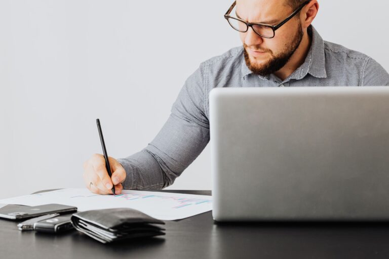 High-Yield Municipal Money Market Funds Quietly Fill Cash Sleeve Demand Financial documents and charts spread across a desk representing portfolio cash management