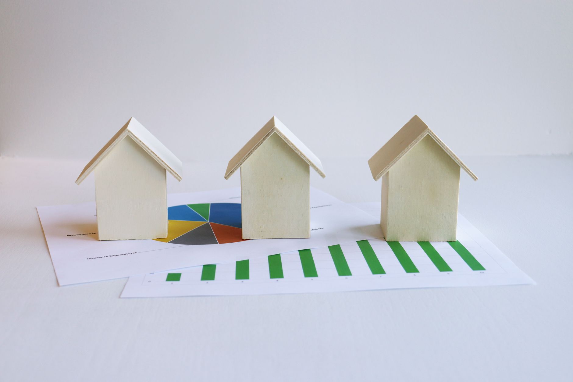 Financial documents and charts representing mortgage-backed securities and real estate investment trust analysis