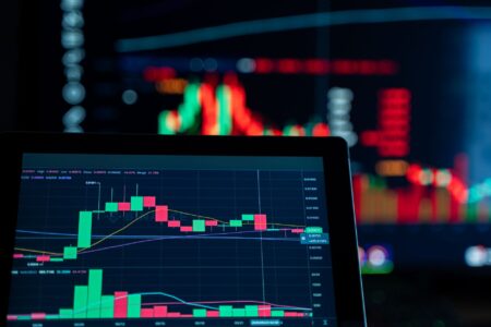 Digital trading screens displaying floating rate bond and loan market data