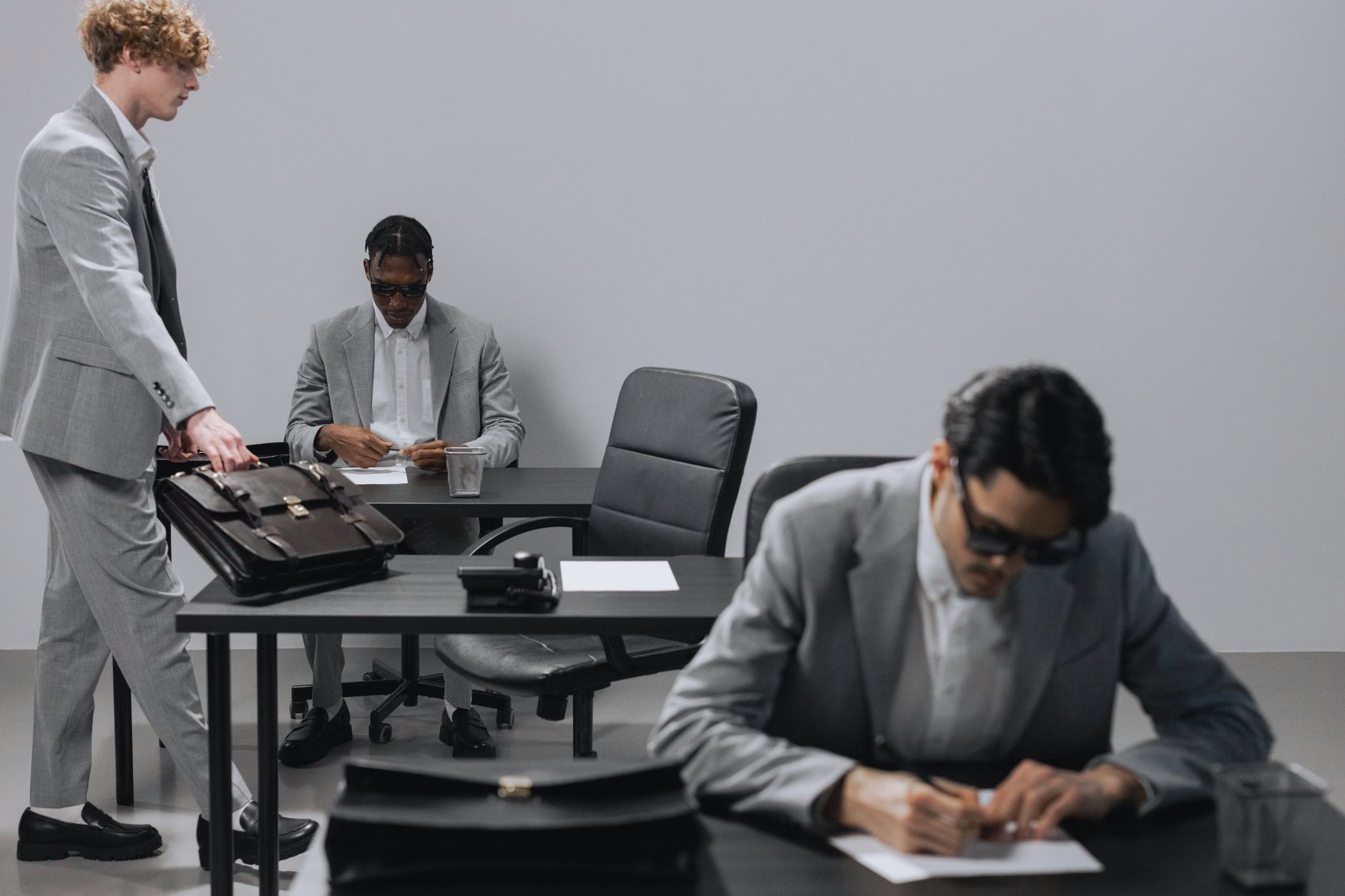 Investors reviewing credit market data and portfolio allocations
