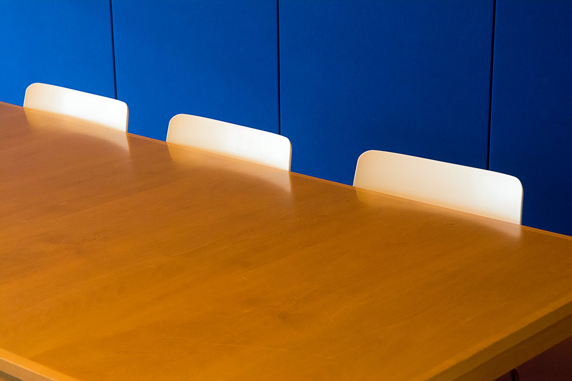 Investors reviewing fund documents at a conference table