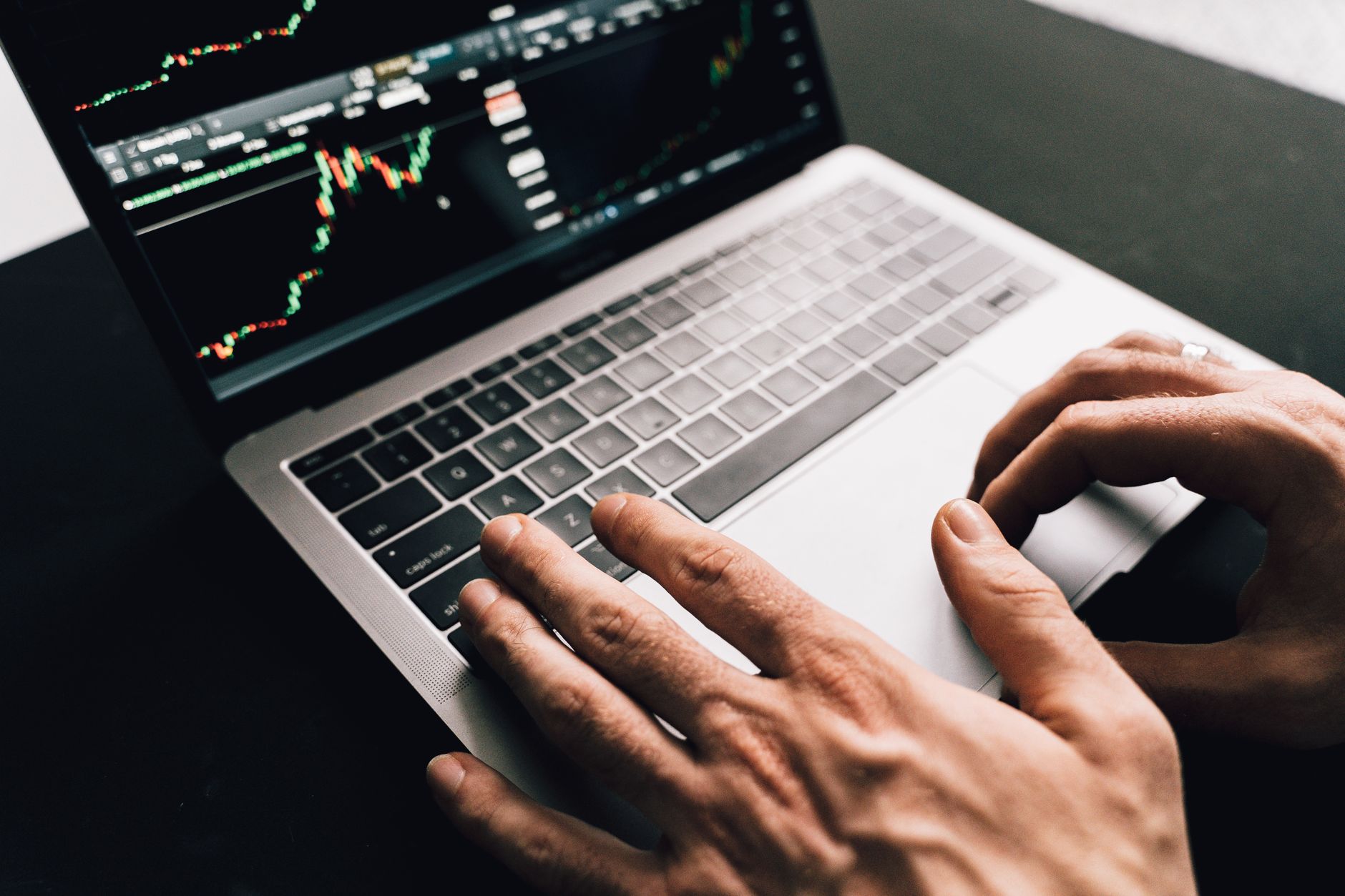Investor reviewing portfolio analysis on a laptop