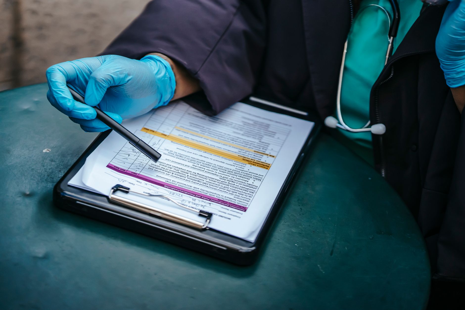 Financial analyst reviewing credit risk documents for a fixed income portfolio