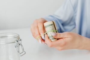 Inflation-Linked Savings Bonds Quietly Resurface Among Cautious Retail Allocators Paper savings bonds and financial documents on a desk representing inflation-protected investments