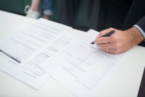 Secondhand Life Insurance Policies Quietly Gain Ground in Yield Portfolios Life insurance policy documents on a desk representing the life settlement market