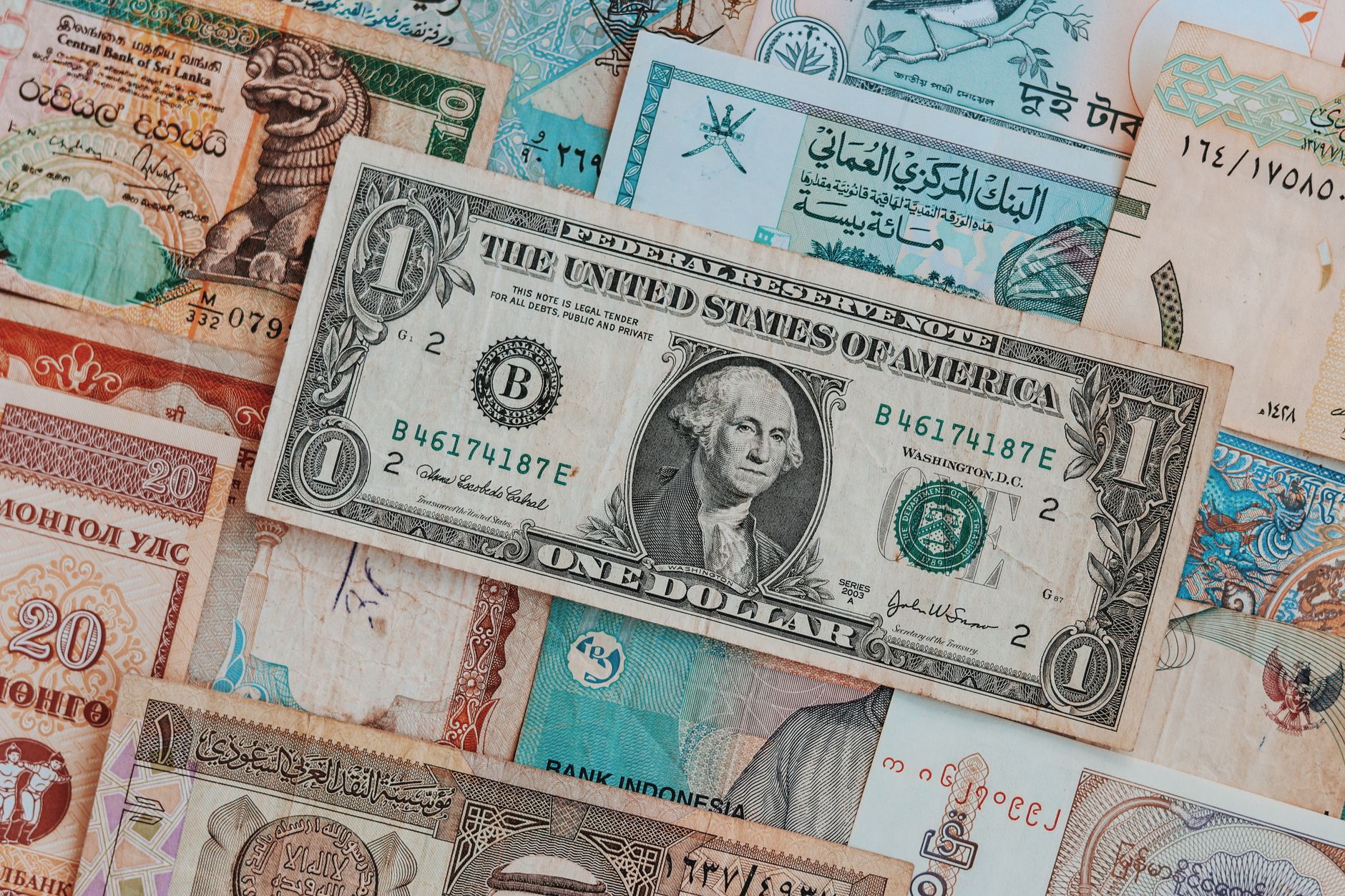 Currency exchange counter displaying multiple international currency rates