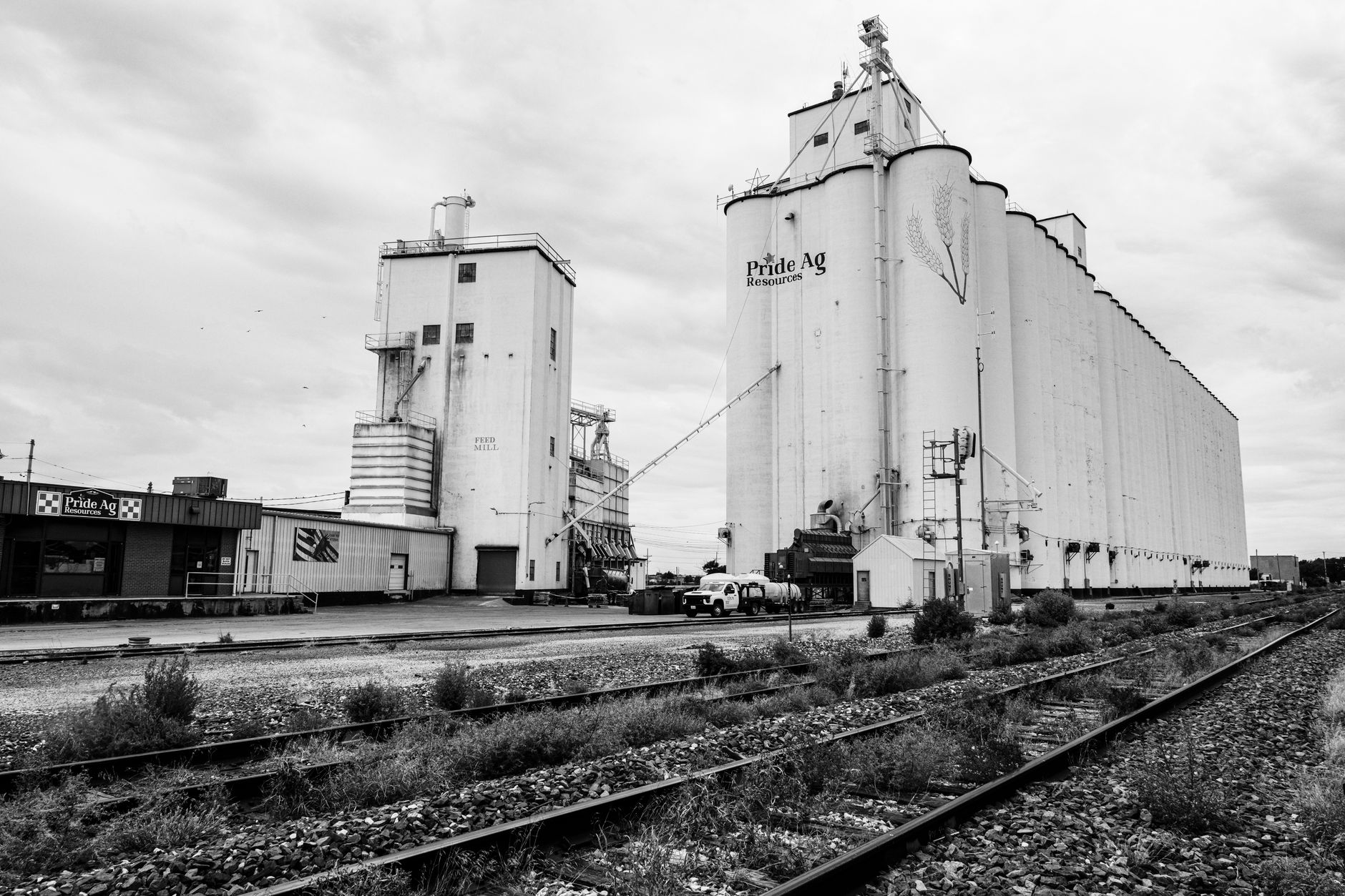 Large grain storage silos representing agricultural commodity assets used as collateral in trade finance