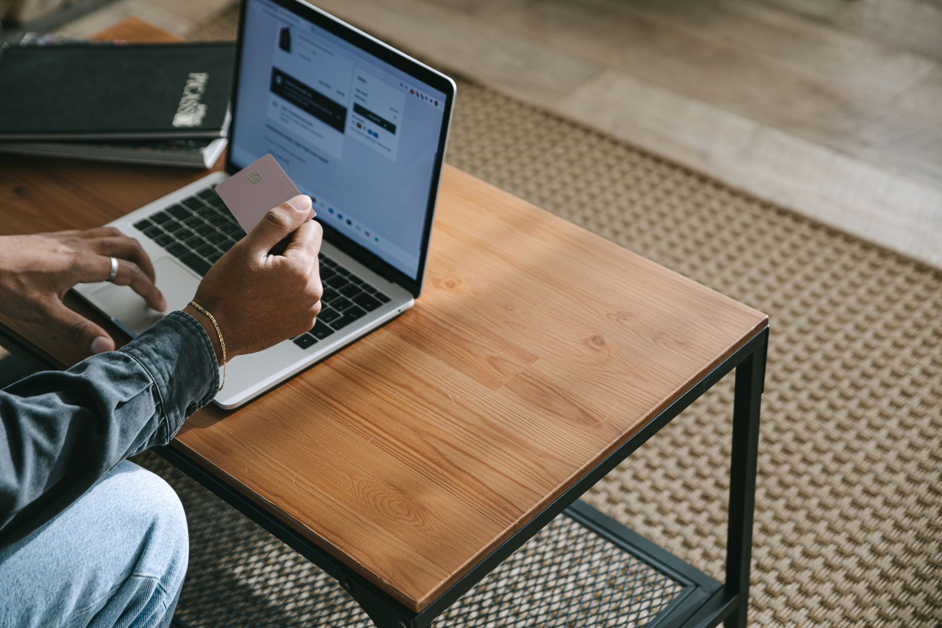 A retail investor reviewing bond portfolio data on a laptop at home