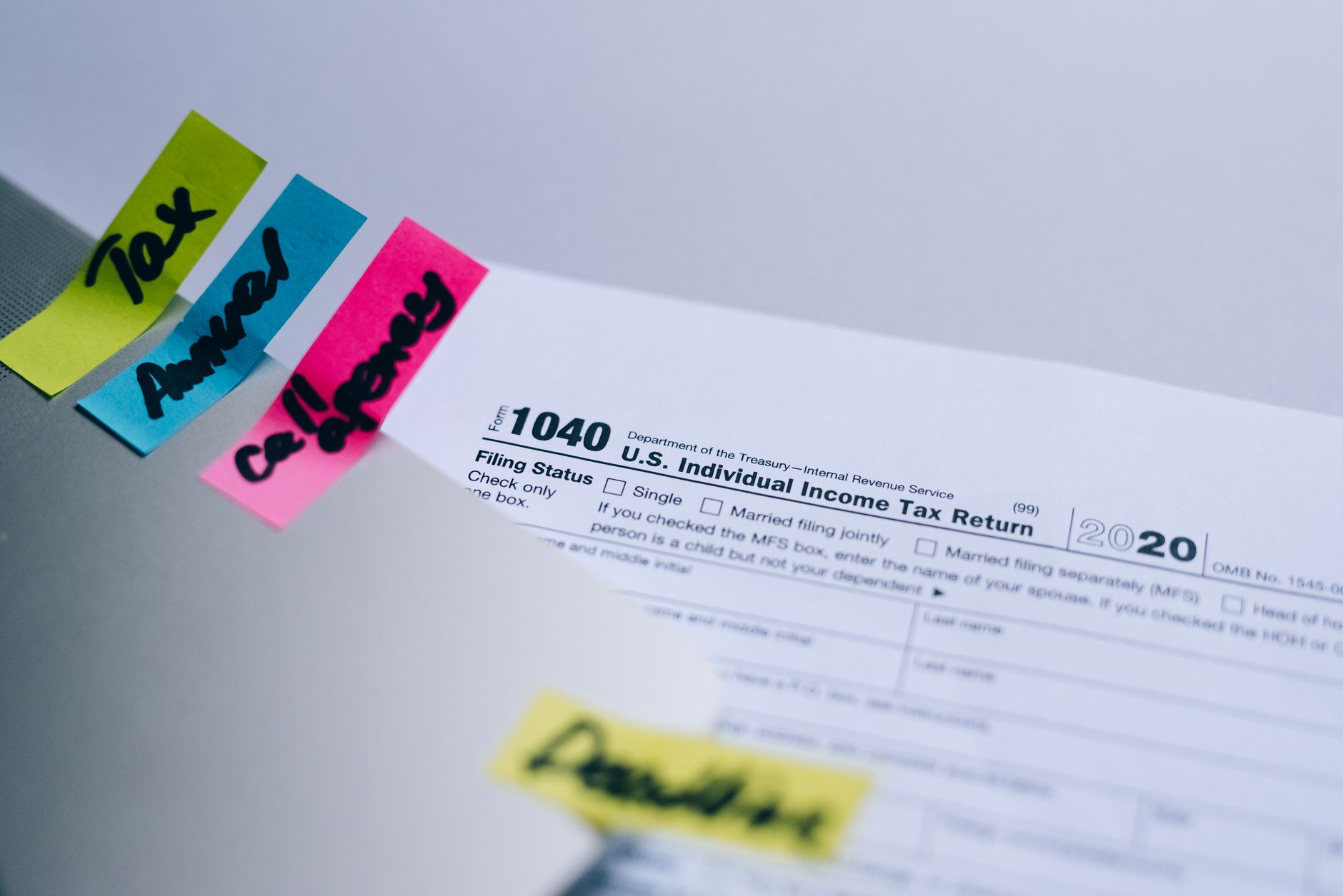 Tax forms and financial documents illustrating tax-exempt income planning for investors